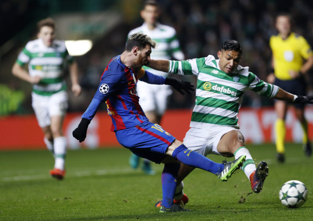 Emilio Izaguirre defending against Lionel Messi