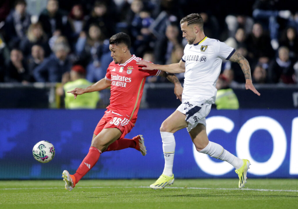 Benfica's Marcos Leonardo in action with Famalicao's Justin de Haas