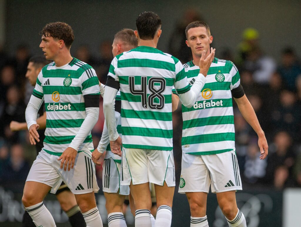 Pre Season Football Friendly, Queens Park versus Celtic; Johnny Kenny of Celtic celebrates with his team mates after he scores in the 20th minute to make it 1-0