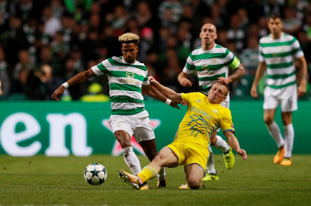 Scott Sinclair taking ball past defender